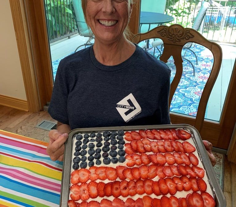 City Serve Team grilled up some tasty burgers along with baked beans, chips, and decorated flag cake.