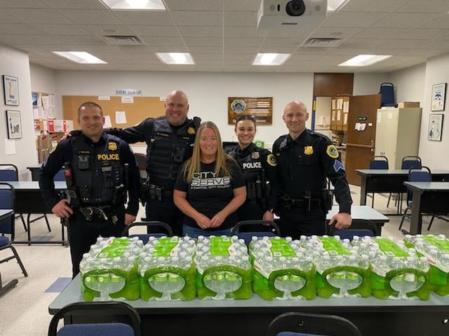 Bottled water and flavor packets for or DSM Police Department